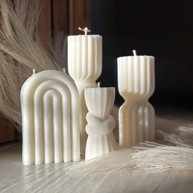 Candele scultura bianche a colonna e ad arco